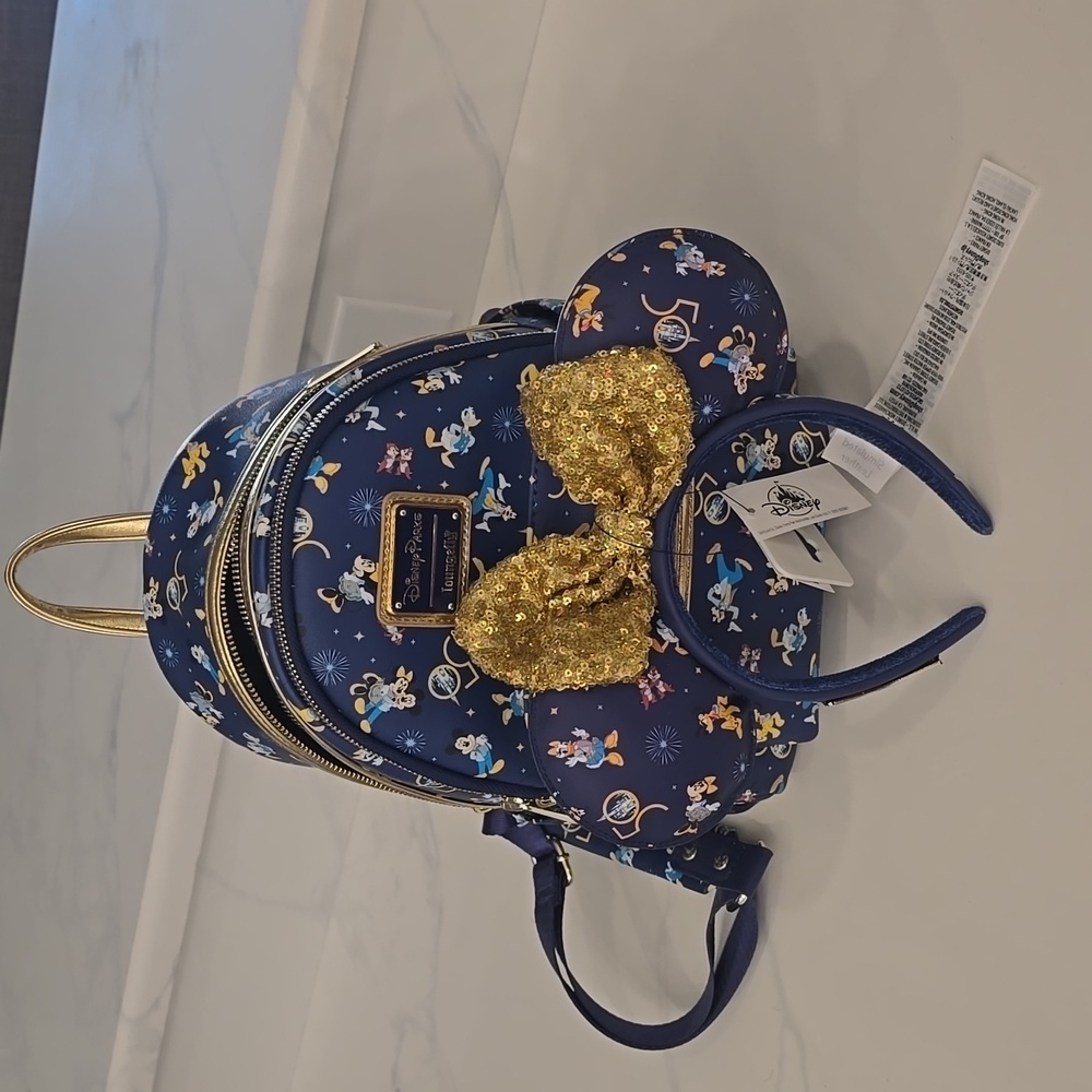 Disney world 50th Anniversary lounge fly and ears